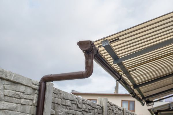 Plastic Downspout Installation in Conroe